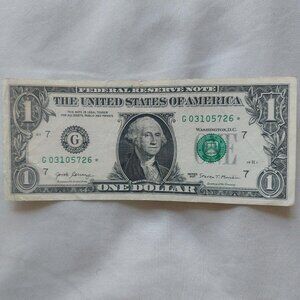 $1 dollar bill with star note